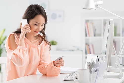 Great Rates - Woman on Phone